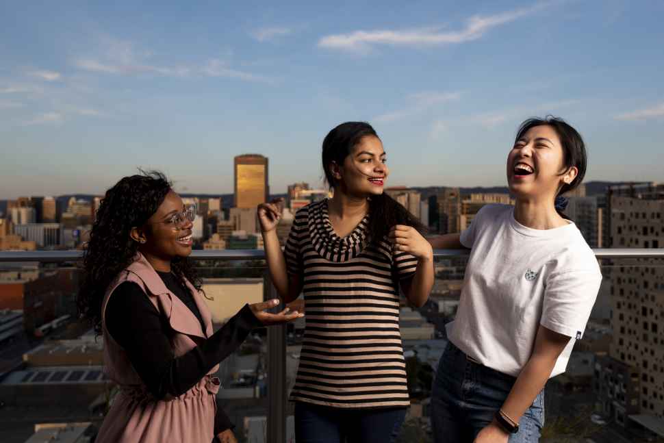 ThreeStudentsLaughing.jpg